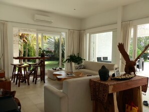 Deluxe Villa, 4 Bedrooms, Ocean View, Beachfront | Living area | LCD TV - Villa Cymopoleia (Seririt)