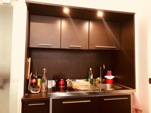 Monolocale | Angolo cottura privato | Frigorifero, microonde, forno, piano cottura