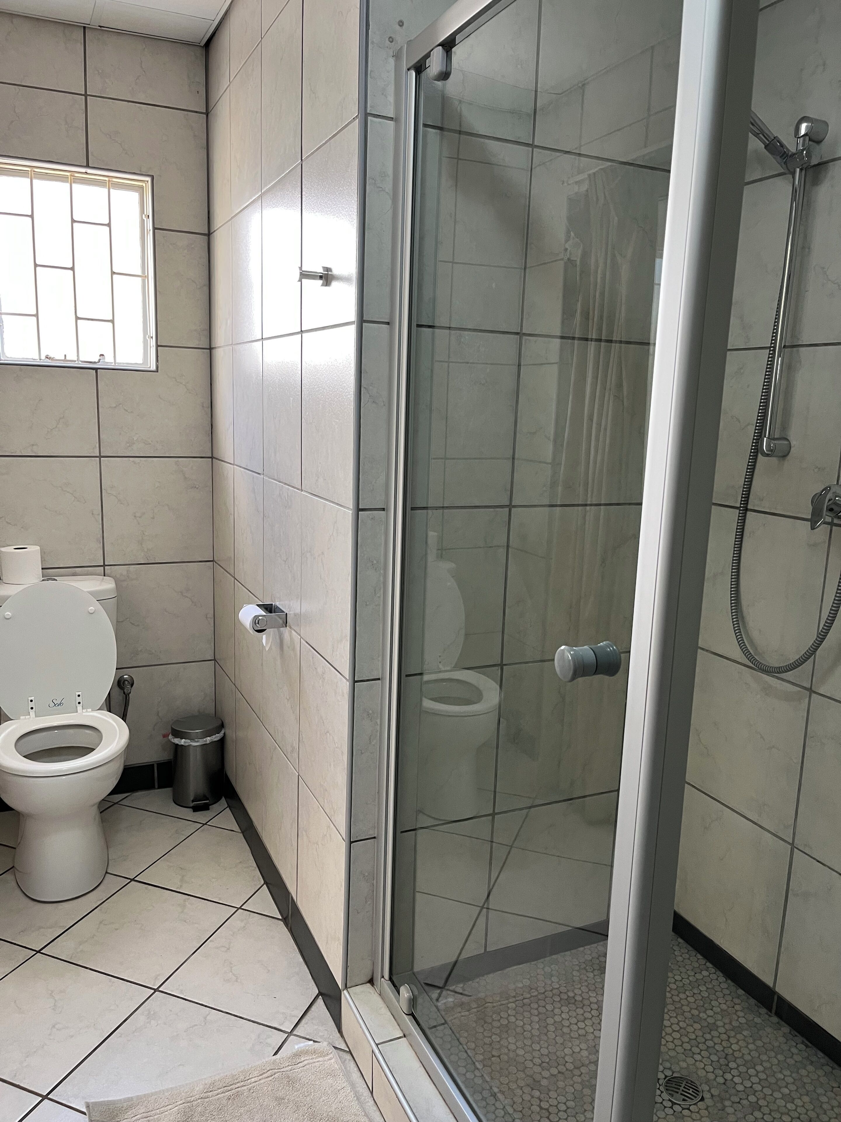 standard triple room (family room 10) | bathroom | shower, rainfall showerhead, towels