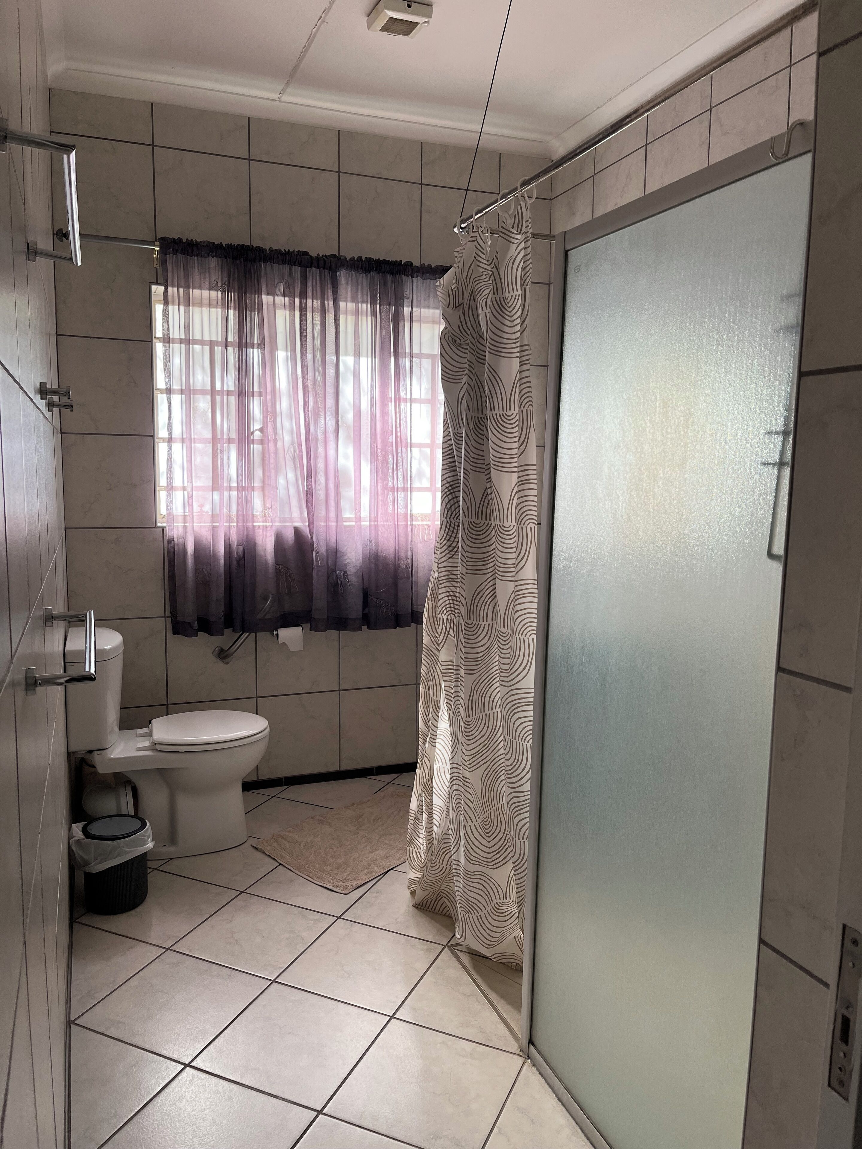 double room (queen room 2) | bathroom | shower, rainfall showerhead, towels
