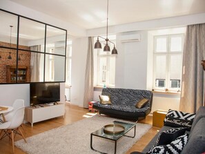 Appartamento Deluxe | Area soggiorno | Smart TV