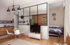 Departamento Deluxe | Área de sala de estar | Smart TV