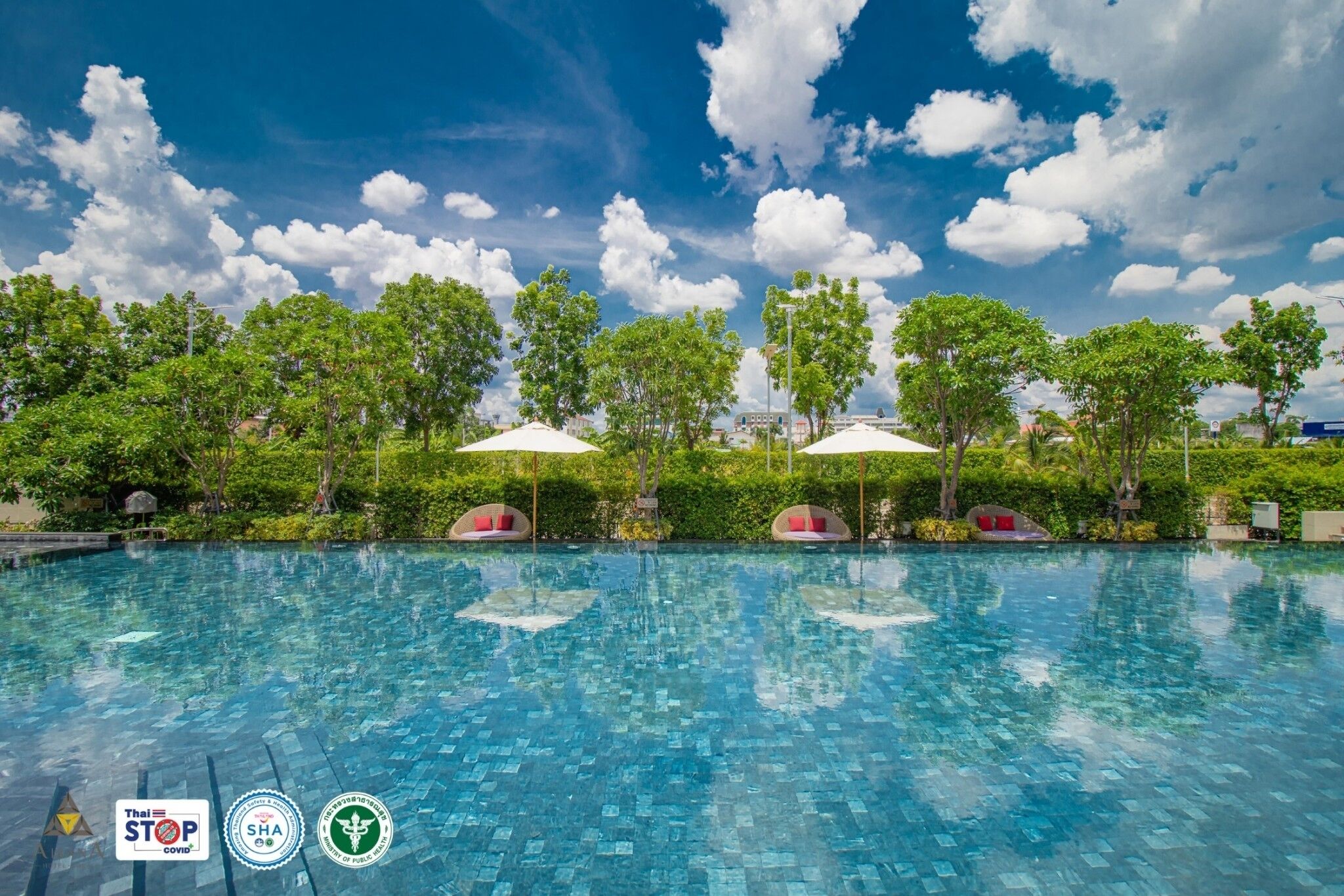 outdoor pool, open 7:00 am to 8:00 pm, pool umbrellas, pool loungers