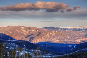 A mountainous landscape with a valley and a river. - Ski-in/Ski-out Cowboy Heaven Cabin - 360 Degree Mtn Views - Private Hot Tub (Big Sky)
