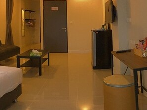 Superior appartement, 1 kingsize bed met slaapbank | Kamervoorziening