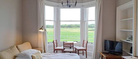 Economy Double Room, 1 Queen Bed with Sofa bed, Golf View, Shared Bathroom | Individually decorated, individually furnished, blackout drapes