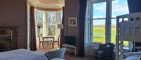 Family Room, Multiple Beds, Golf View | Individually decorated, individually furnished, blackout curtains