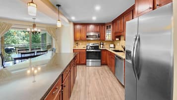 Condo, 2 Bedrooms | Private kitchen | Fridge, microwave, oven, dishwasher