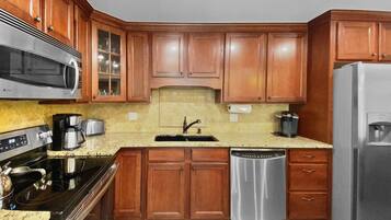 Condo, 2 Bedrooms | Private kitchen | Fridge, microwave, oven, dishwasher
