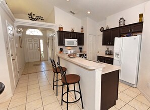 Fridge, stovetop, dishwasher, electric kettle