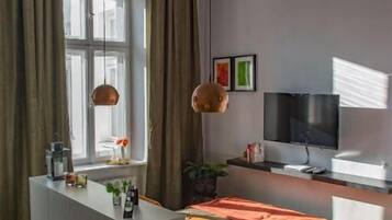 Studio Suite, 1 Queen Bed, Balcony | Individually decorated, individually furnished, desk, laptop workspace