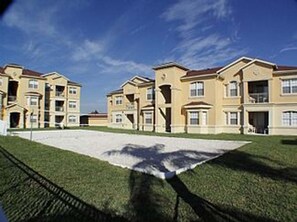 A multi-story residential building with a symmetrical facade, large windows, and a central entrance. - Ridge Castle (Davenport)