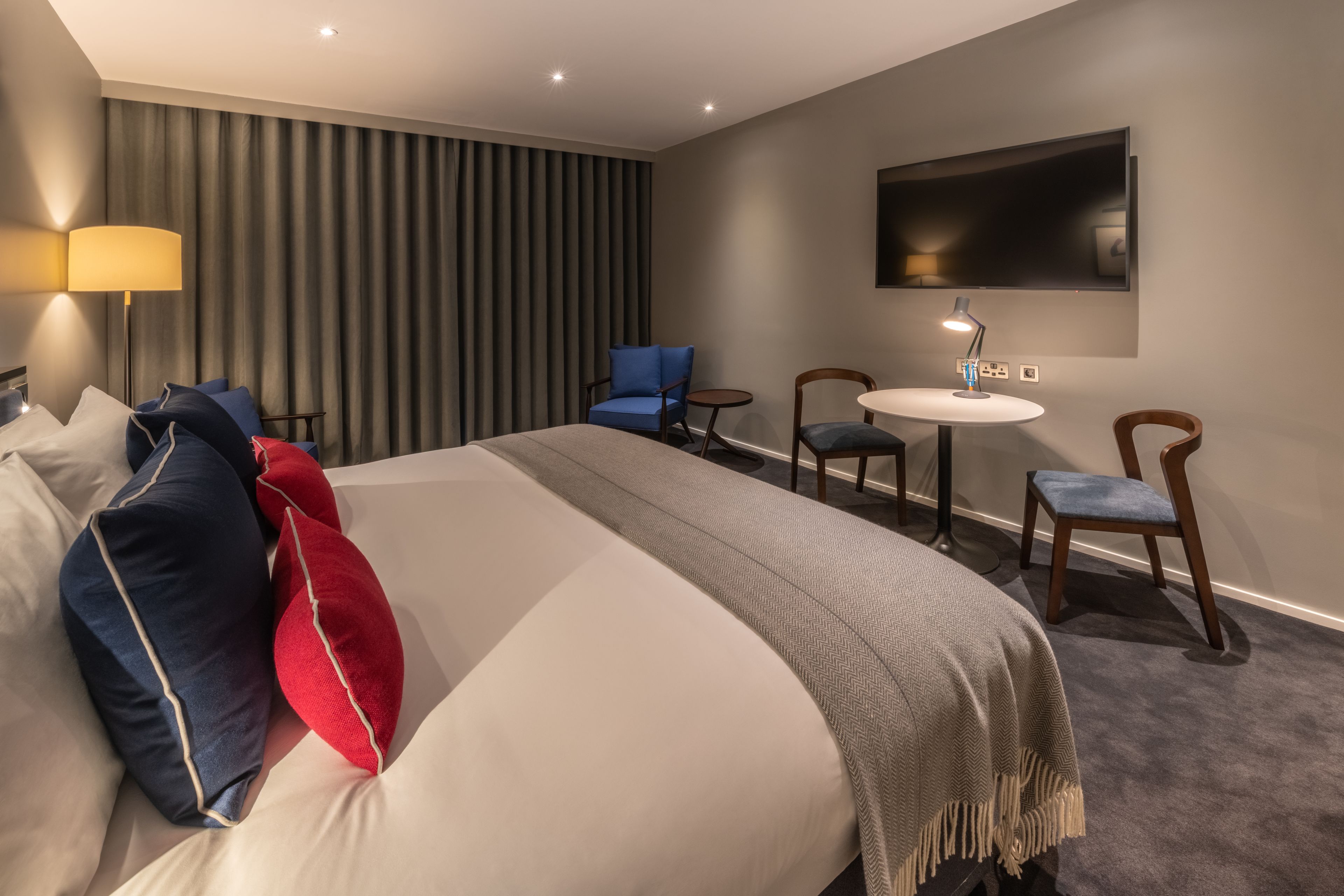 junior suite | in-room safe, desk, laptop workspace, iron/ironing board