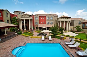 Outdoor pool, pool umbrellas, sun loungers