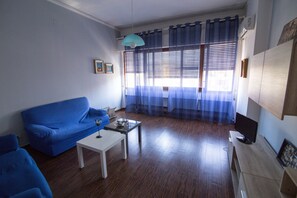 Familienapartment | Wohnbereich | Flachbildfernseher