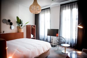 Junior suite | Luxe beddengoed, een kluis op de kamer, verduisterende gordijnen