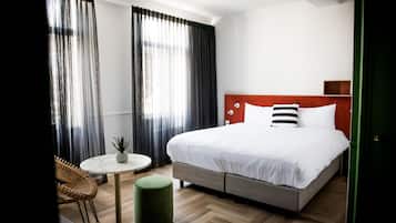 Luxe beddengoed, een kluis op de kamer, verduisterende gordijnen