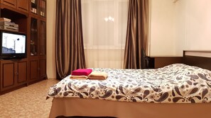 Appartement | 1 chambre, bureau, fer et planche à repasser, Wi-Fi gratuit