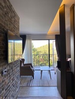 Economy Room, 1 Bedroom, Mountain View | Living area | 55-inch LCD TV with satellite channels, tablet, heated floors