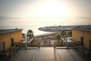 Chambre Deluxe Double ou avec lits jumeaux | Vue sur la plage/l’océan