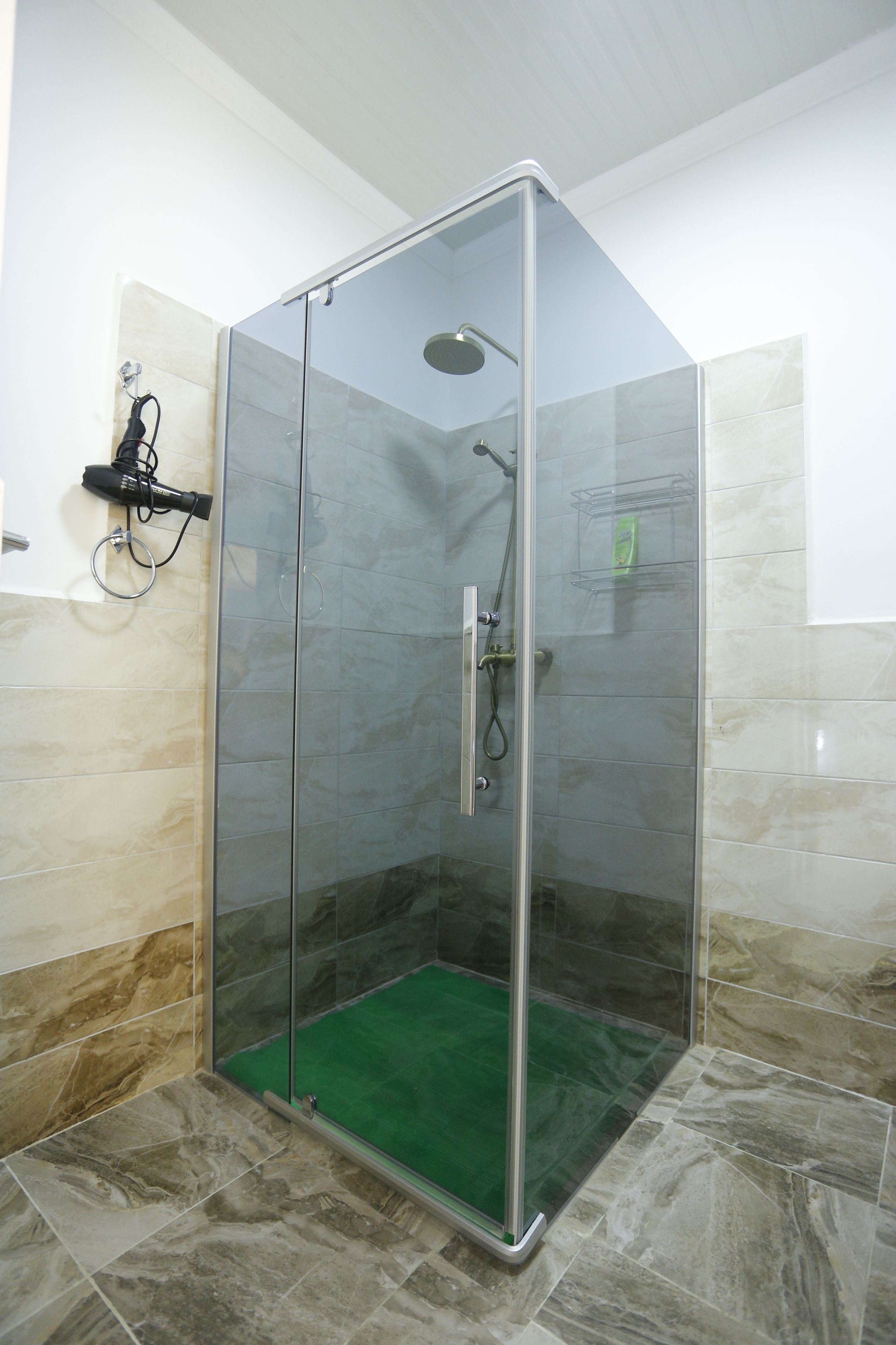 Shower, free toiletries, slippers, towels
