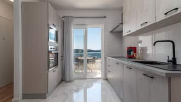 Luxury Apartment | Private kitchen | Microwave, oven, stovetop, coffee/tea maker
