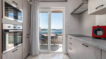 Luxury Apartment | Private kitchen | Microwave, oven, stovetop, coffee/tea maker