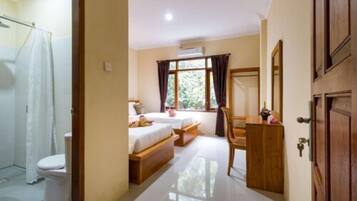 Deluxe Twin Room, 2 Single Beds | In-room safe, desk, free WiFi, bed sheets