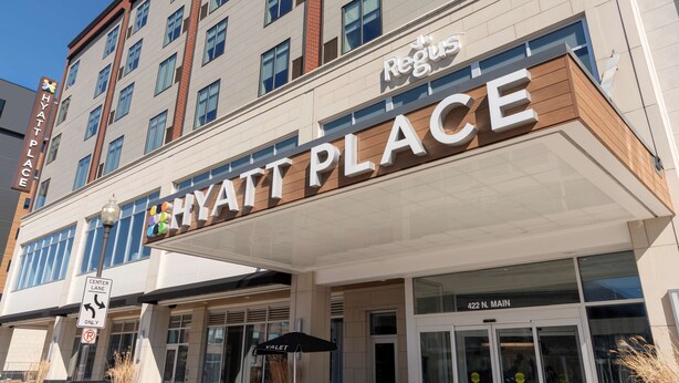 A multi-story hotel with a sign reading "Hyatt Place" and "Regis" above it. - Hyatt Place Detroit Royal Oak (Royal Oak)