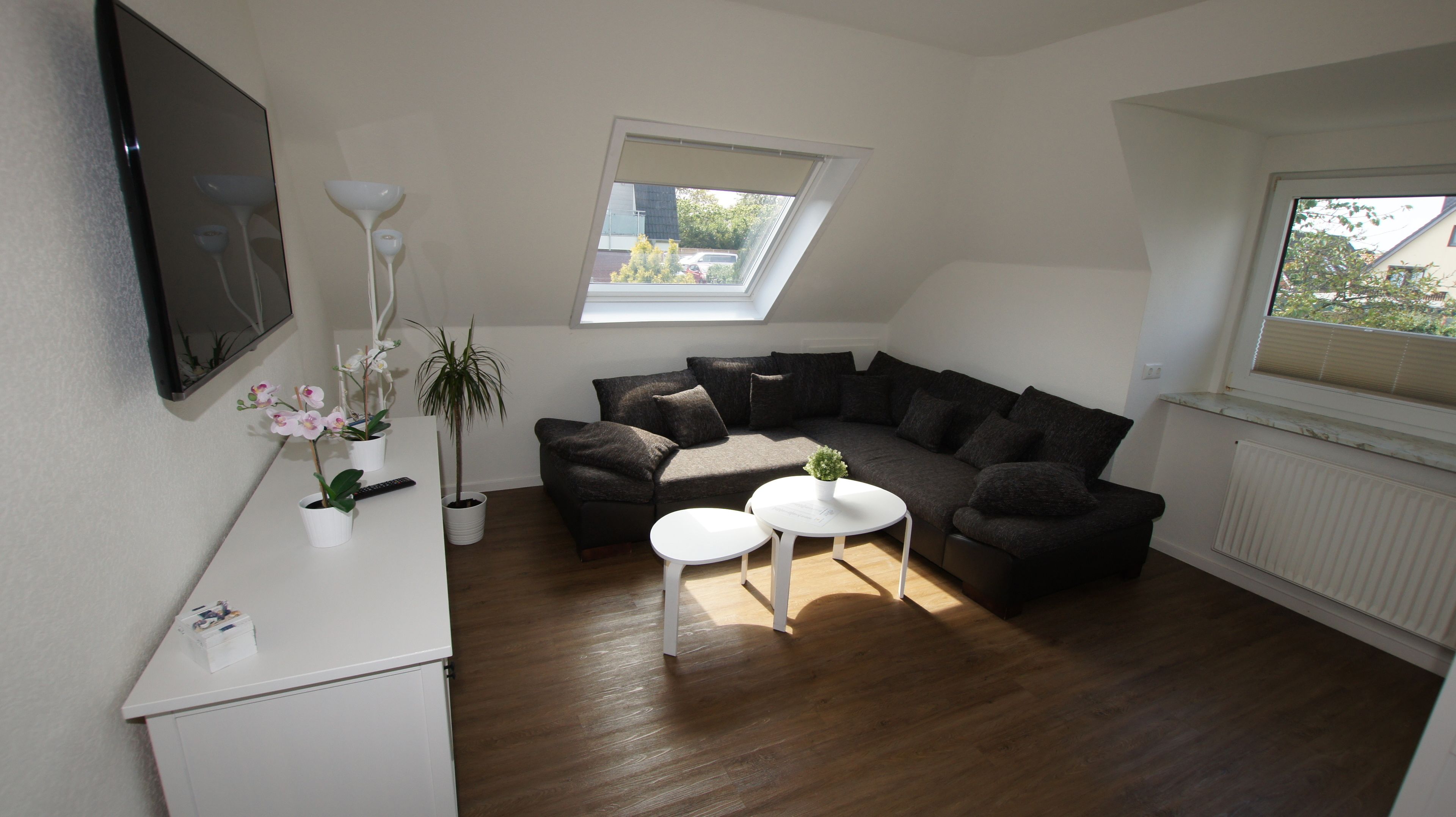 comfort apartment, balcony | living room | flat-screen tv