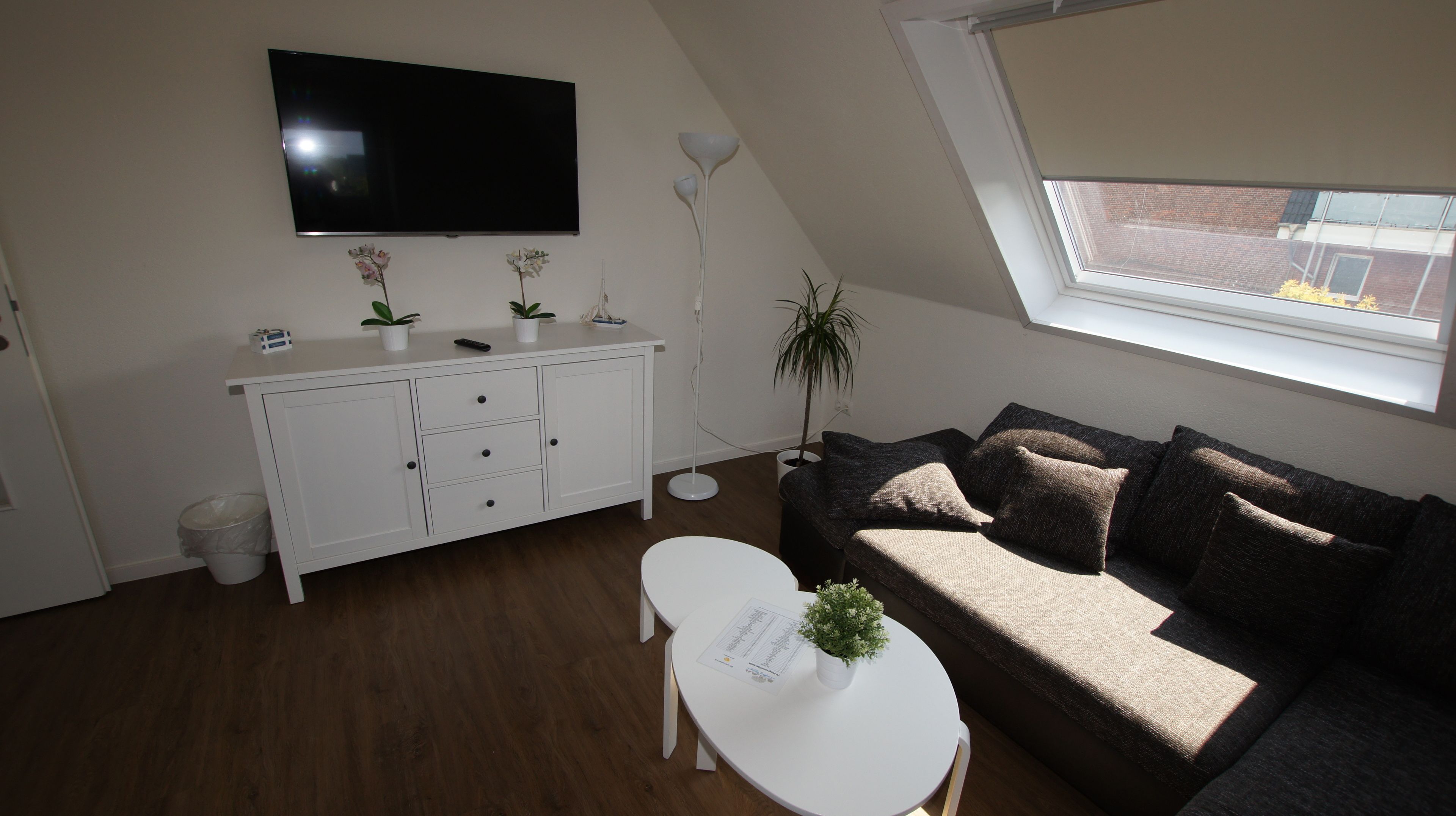 comfort apartment, balcony | living room | flat-screen tv