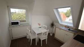 Comfort Apartment, Balcony | Private kitchen - Hotel Dorfkrug Büsum (Büsum)