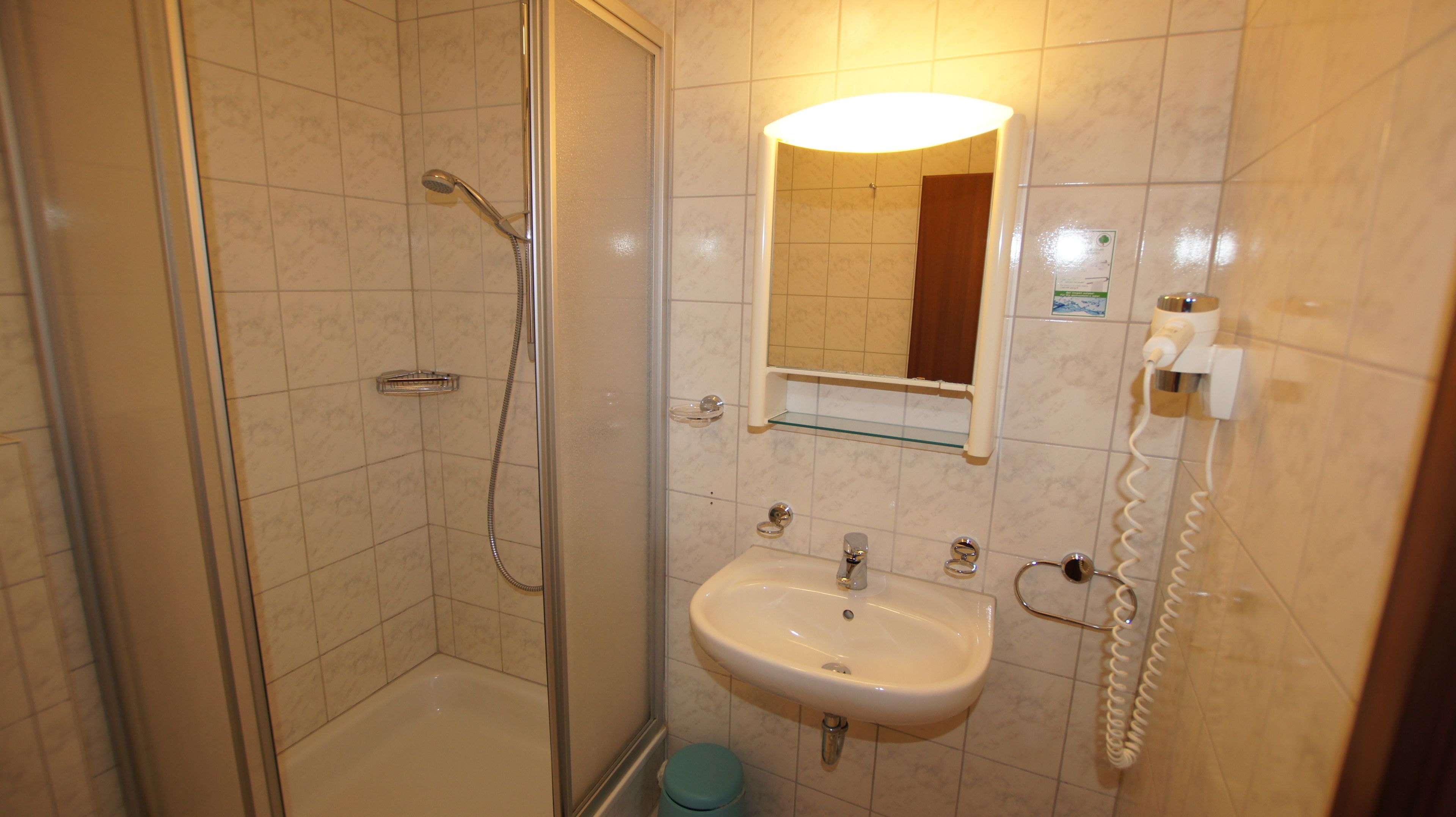 standard triple room | bathroom | shower, hair dryer, towels