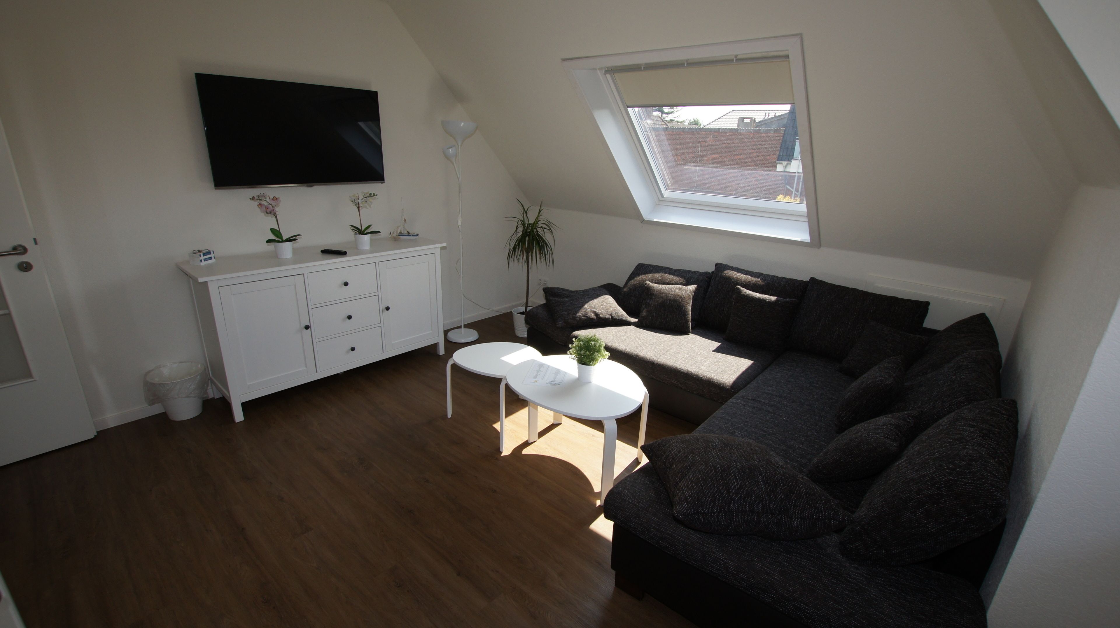 comfort apartment, balcony | living room | flat-screen tv