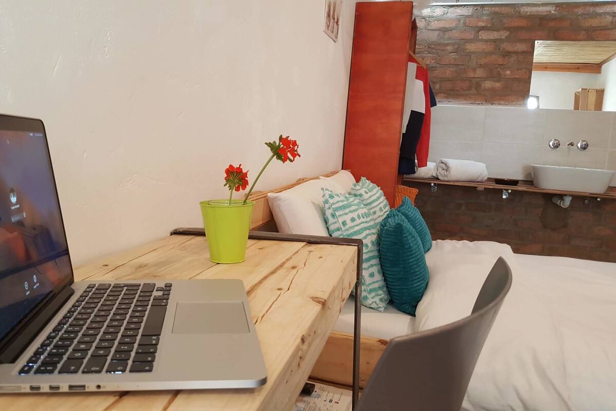Hypo-allergenic bedding available, desk, laptop workspace