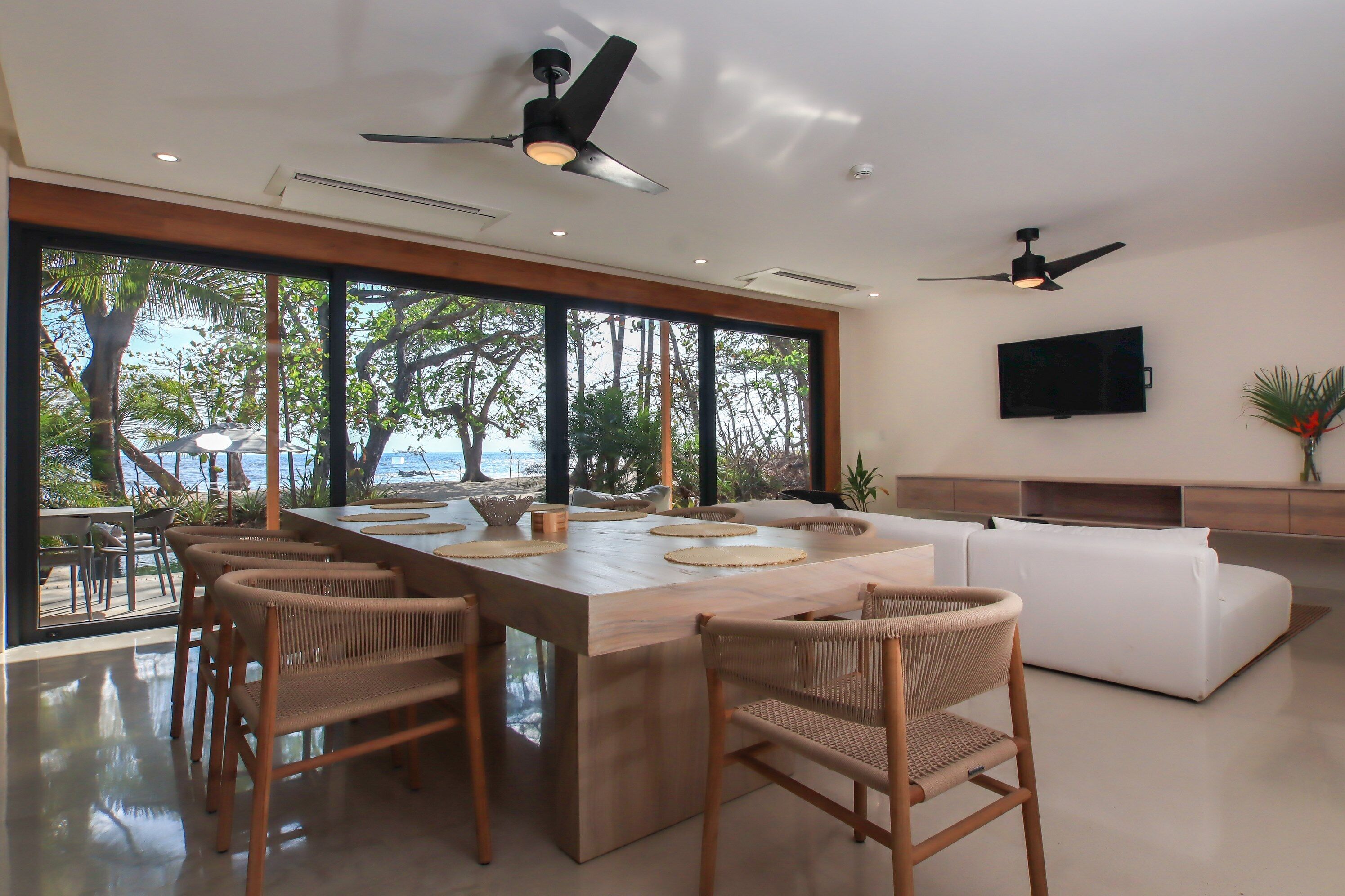 luxury villa, private pool, ocean view | living area | 42-inch flat-screen tv with cable channels, tv
