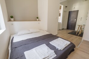 Apartment, Non Smoking, Balcony | 1 bedroom, individually decorated, individually furnished, desk