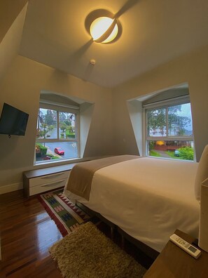 Deluxe Apartment, 2 Bedrooms | Individually decorated, individually furnished, blackout drapes