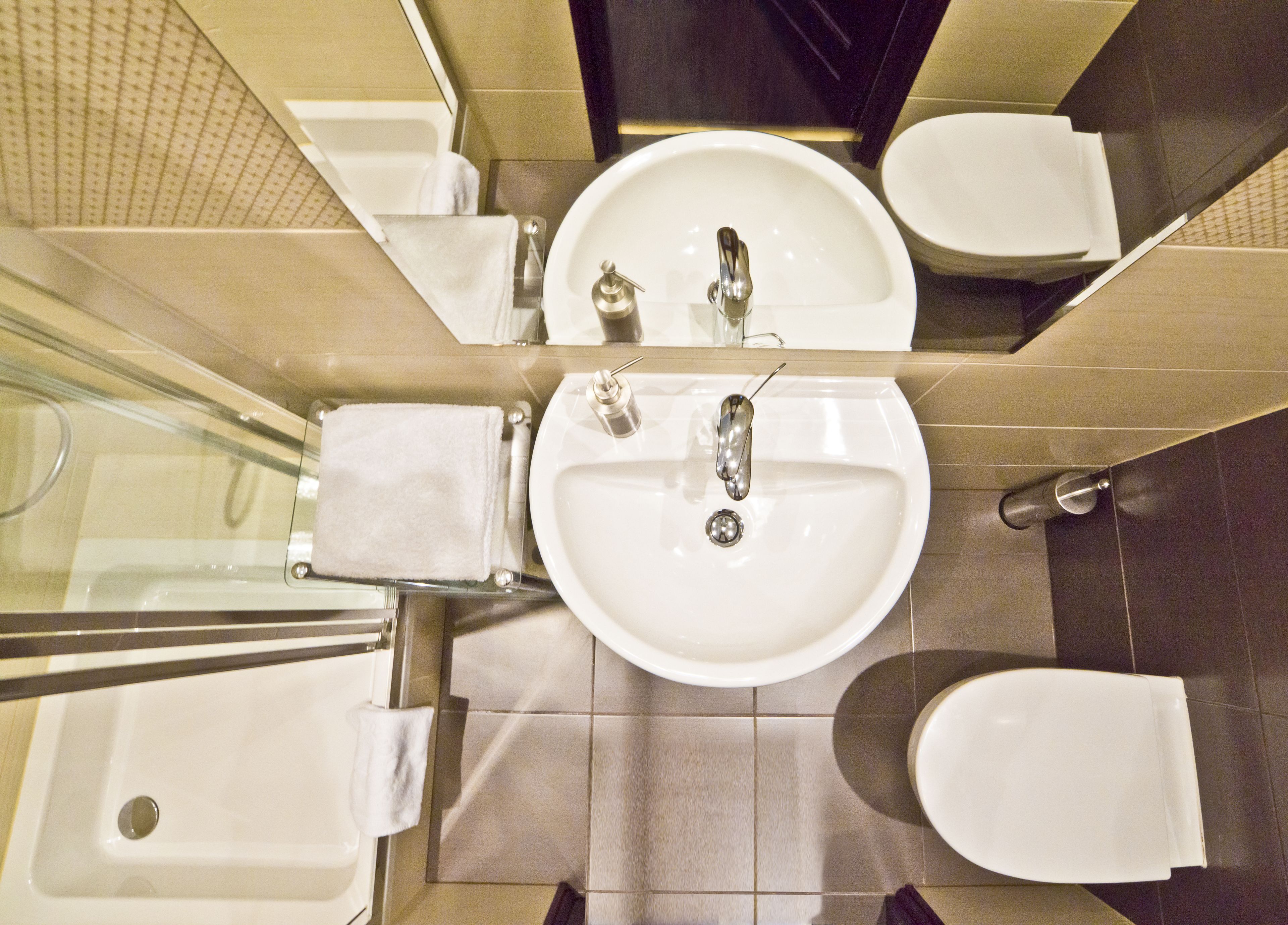 studio | bathroom | designer toiletries, hair dryer, slippers, towels