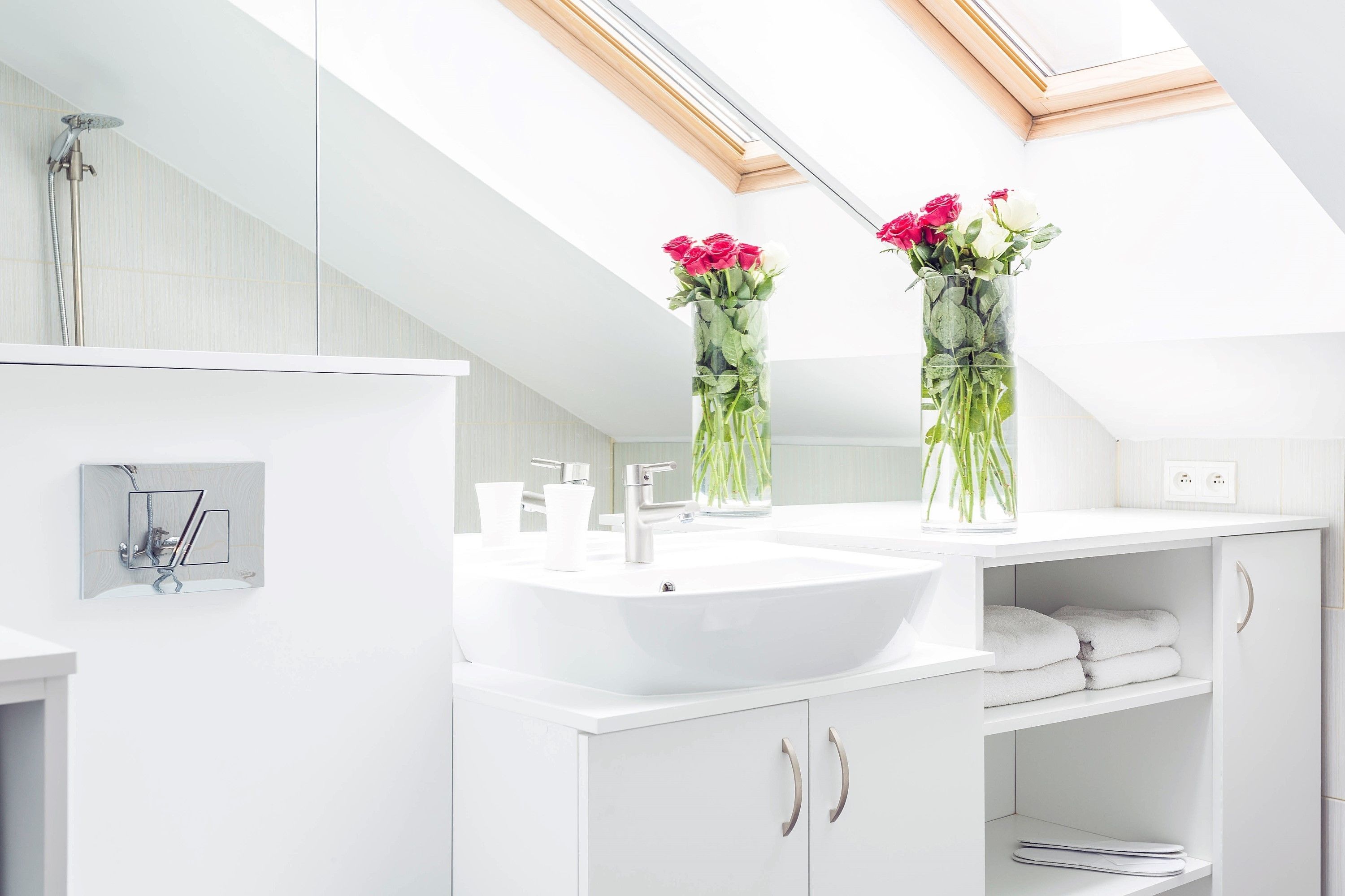 deluxe apartment | bathroom | designer toiletries, hair dryer, slippers, towels