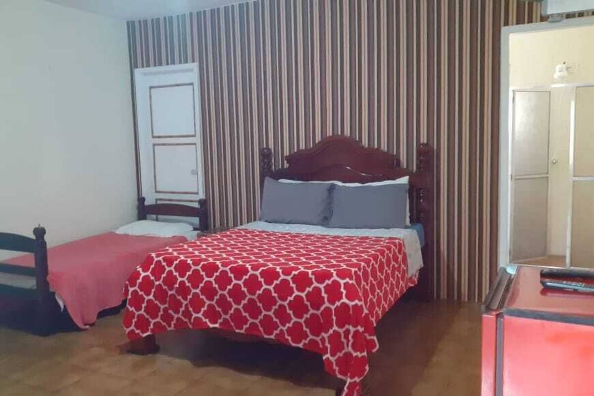 Family Room | 1 bedroom, blackout curtains, free WiFi