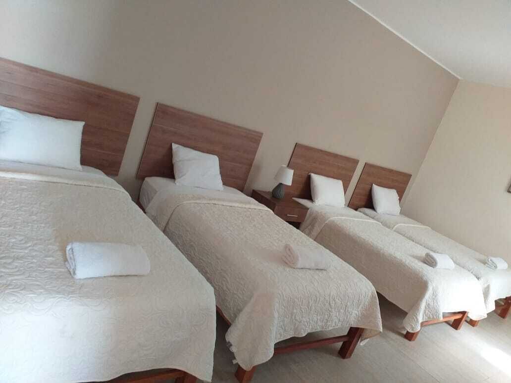 quadruple room, 1 bedroom, non smoking, private bathroom | desk, free wifi, bed sheets