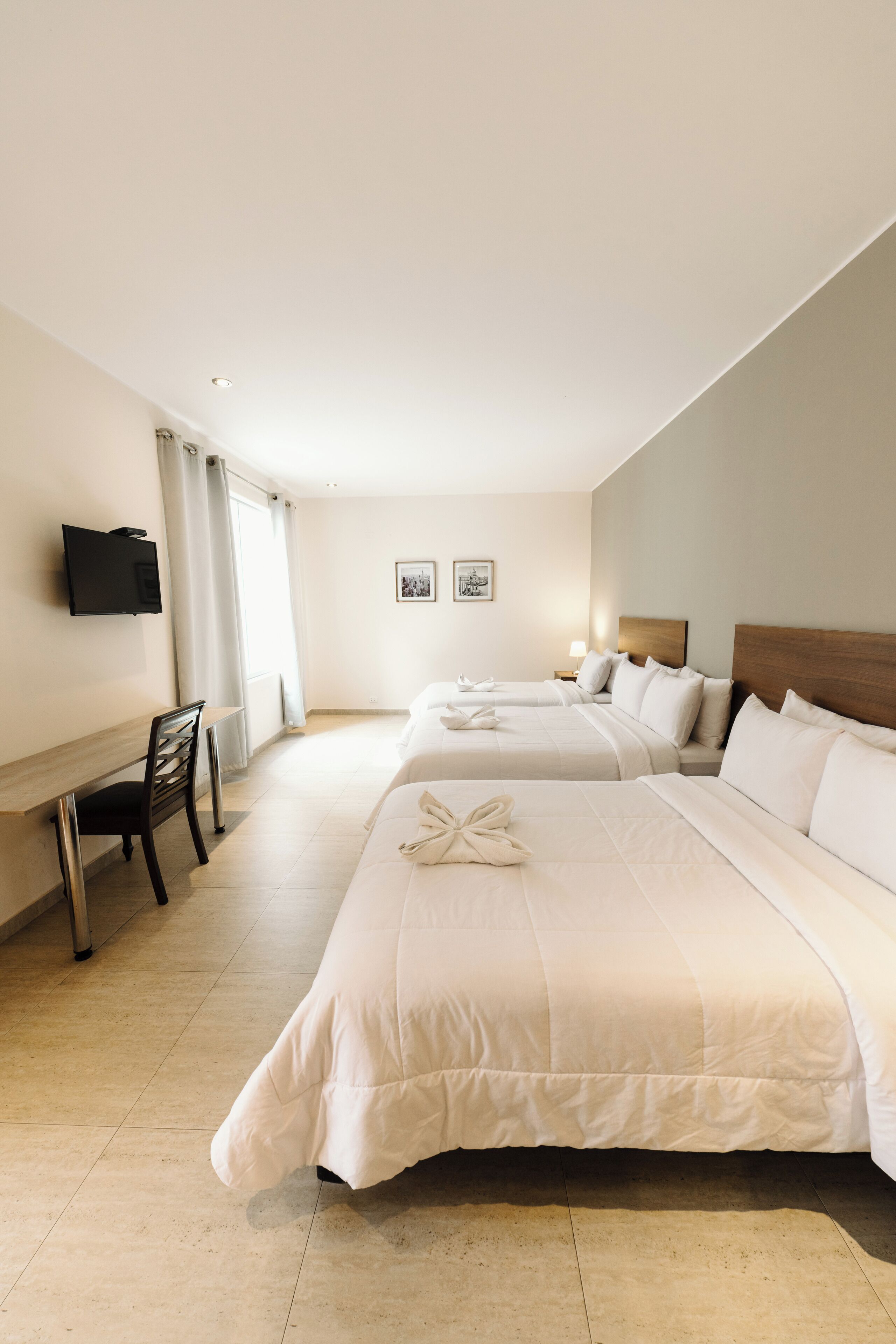 Triple Room, 1 Bedroom, Non Smoking, Private Bathroom | Desk, free WiFi, bed sheets