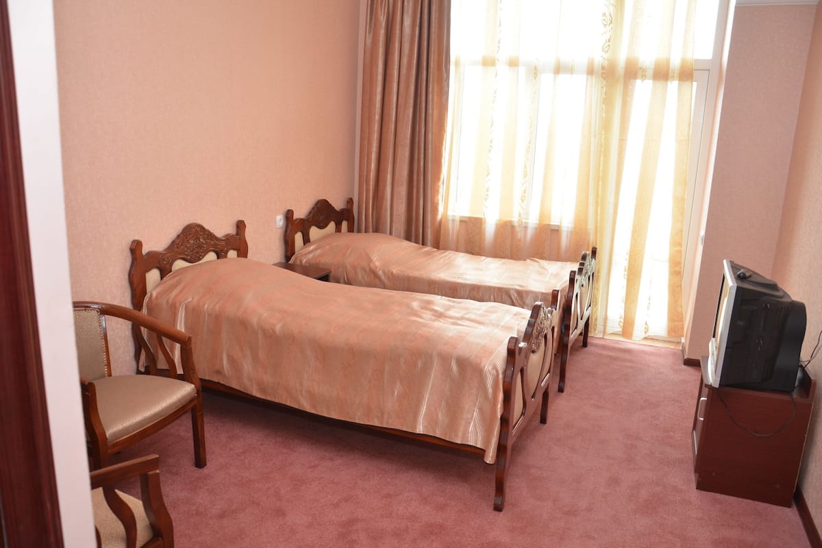 Chambre Junior avec lits jumeaux