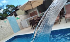 2 outdoor pools, open 10 AM to 9 PM, pool umbrellas