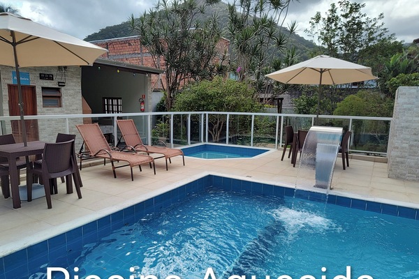 2 outdoor pools, open 10 AM to 9 PM, pool umbrellas