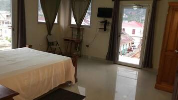 Family Double Room, 2 Bedrooms, City View | Blackout curtains, iron/ironing board, free WiFi, bed sheets