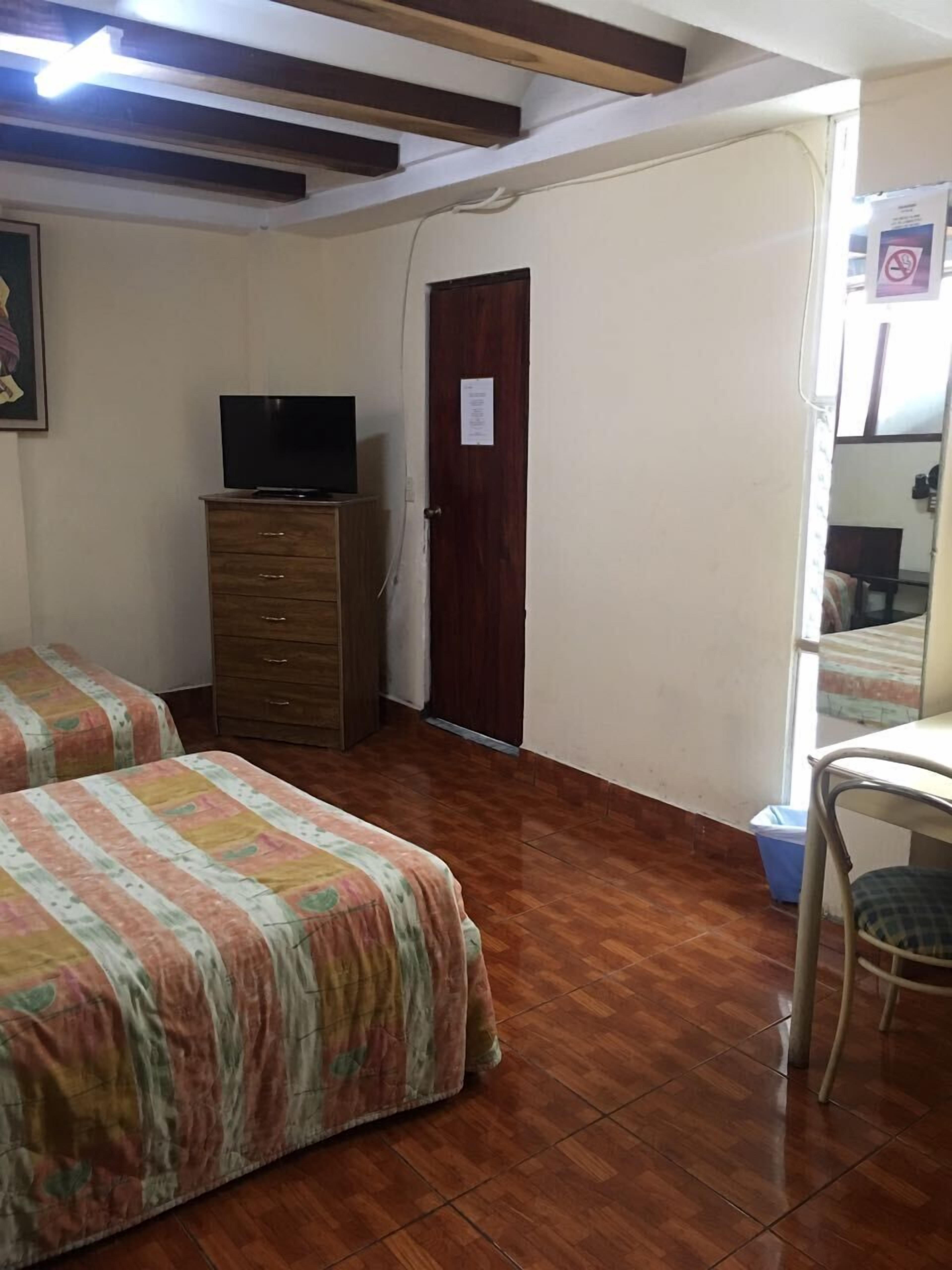 classic double room, multiple beds, non smoking | in-room safe, desk, free wifi, bed sheets