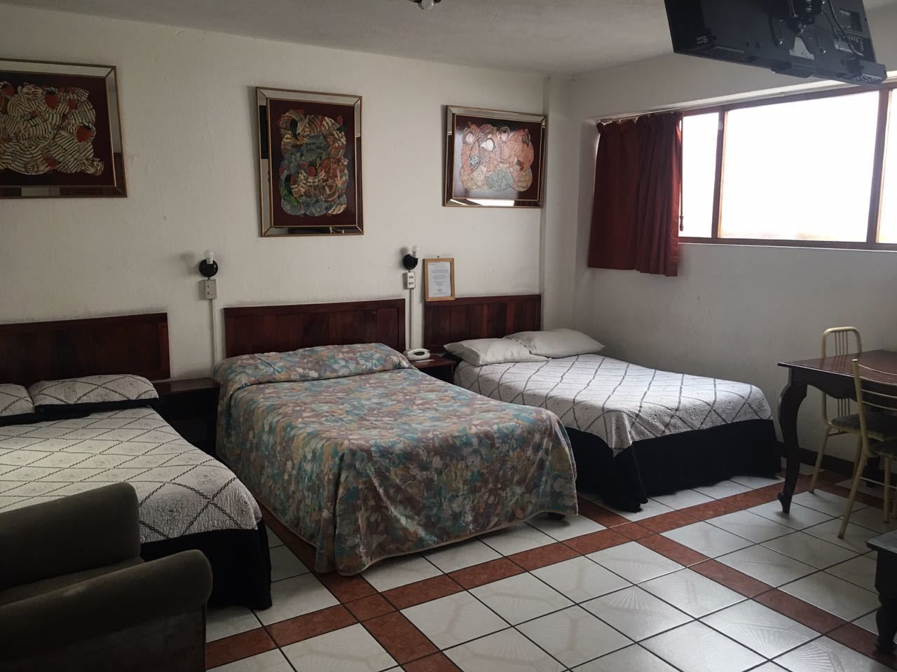 classic triple room, multiple beds, non smoking | in-room safe, desk, free wifi, bed sheets