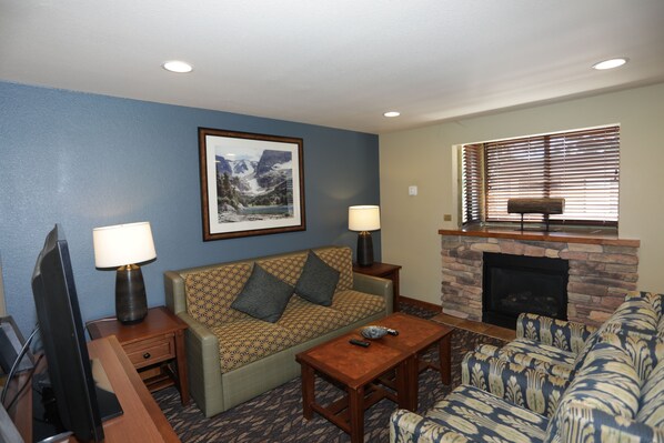 Televisión, chimenea y reproductor de DVD